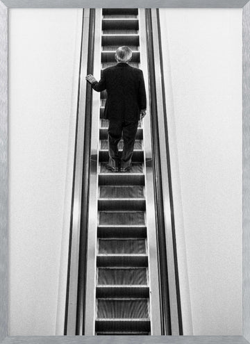 Solitary Escalator Climb | Poster - Silver Frame Interior