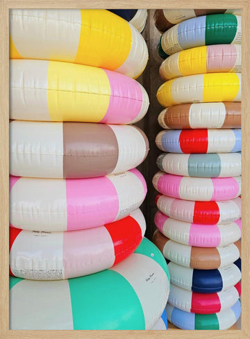Colorful Stacked Pool Rings | Poster - Wood Frame Interior